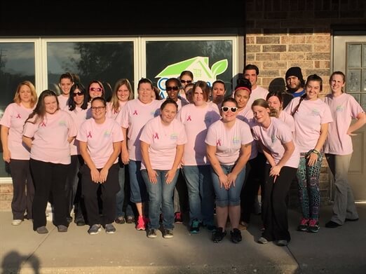 Our Cary Crew Posing in Pink Shirts