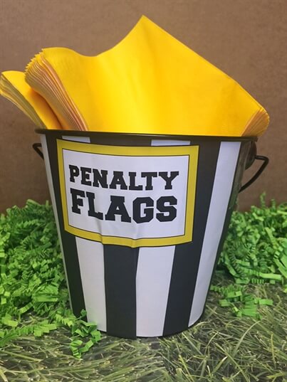 Napkins in a Penalty Flag Bucket