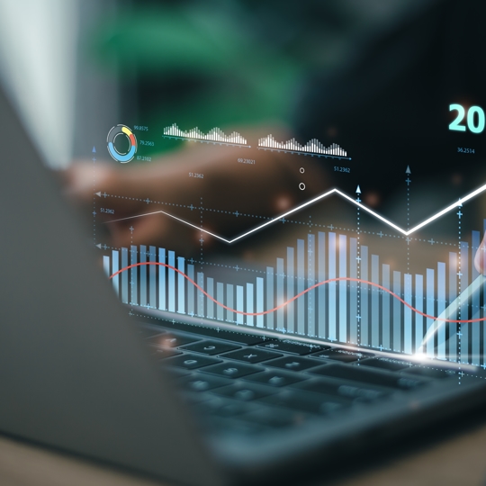 a computer with a chart that says 2024