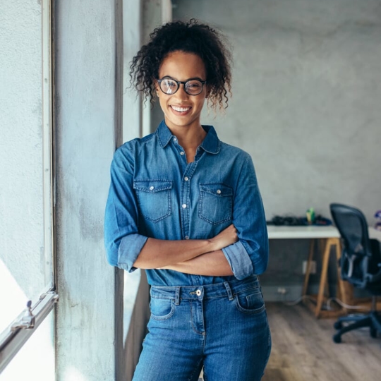 Women standing smiling